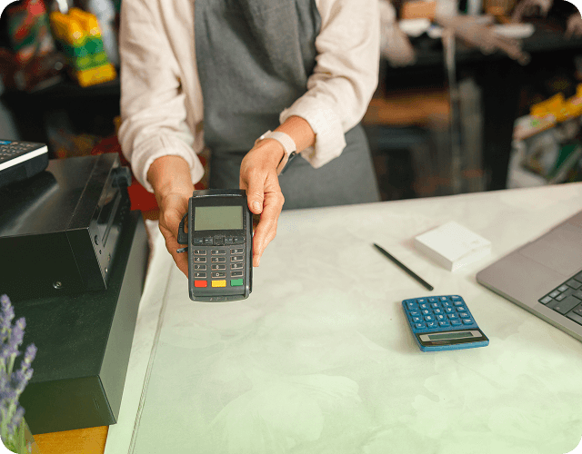 Customer making a payment using a POS terminal